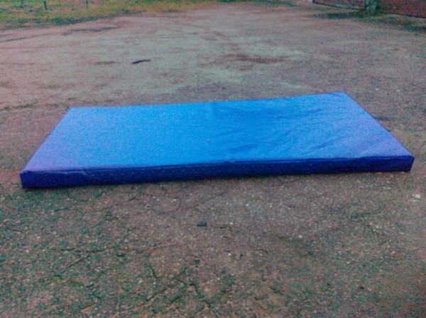 Čiūžinys sporto čiūžiniui, imtynių čiūžinio užvalkalas